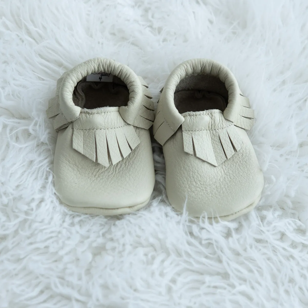 Bone Fringe Moccasins